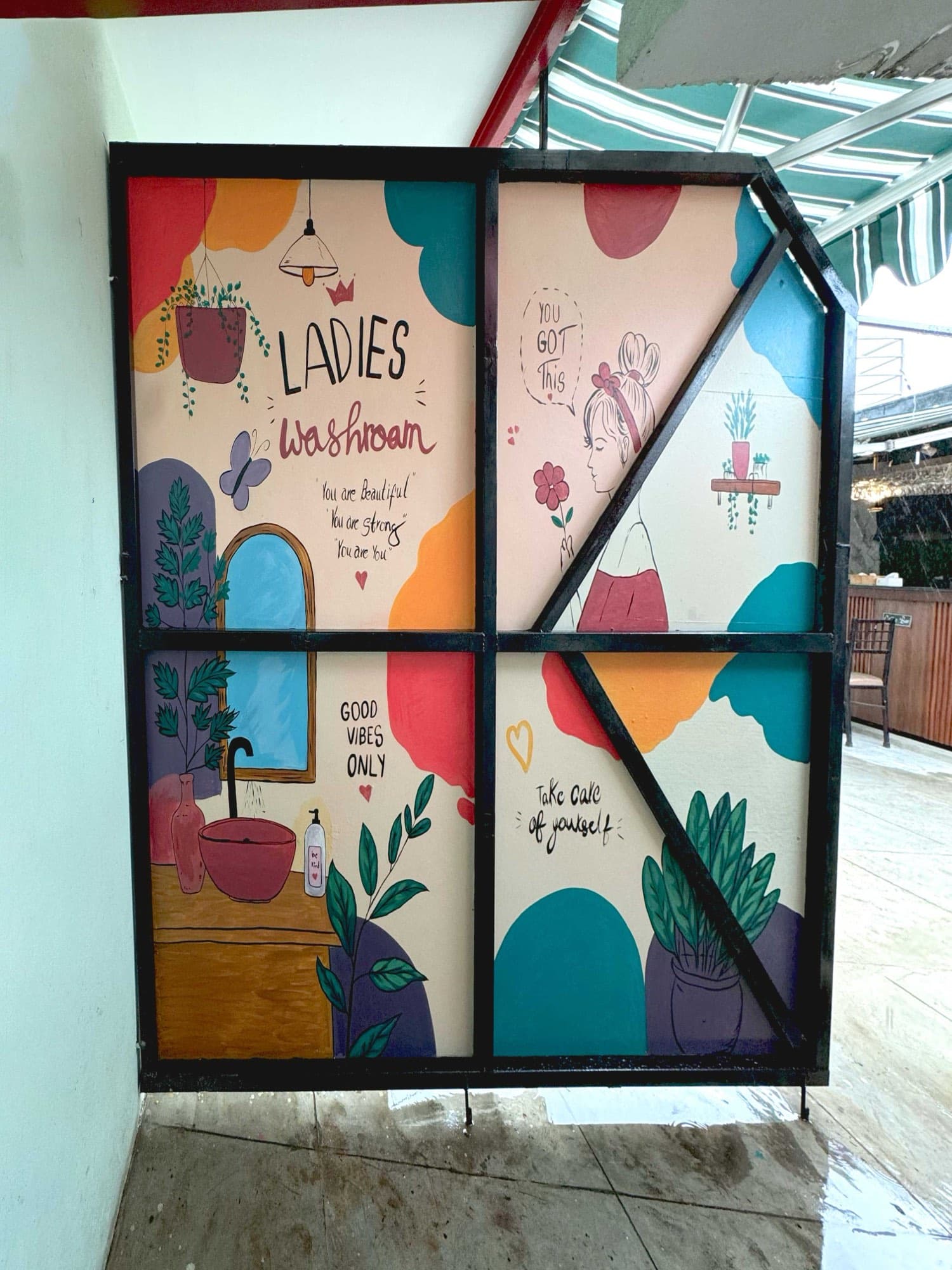 Hand-painted wall art across the premises
